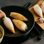 Come preparare calamari ripieni in rapidità? Il trucco per evitare che si svuotino durante la cottura
